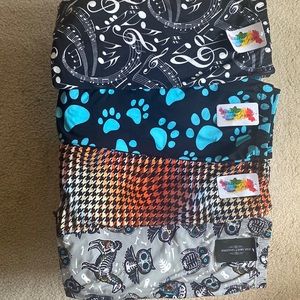 NWT 4 Pair Plus size Leggings from “Mad About Leggings”